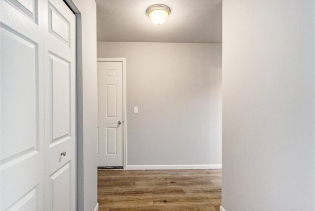 58983 Norton St, Mattawan, MI 49071 - corridor with wood finished floors and baseboards