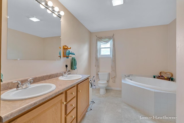5777 N Broadway, Freeport, MI 49325 - full bathroom with toilet, double vanity, a garden tub, tile patterned flooring, and baseboards