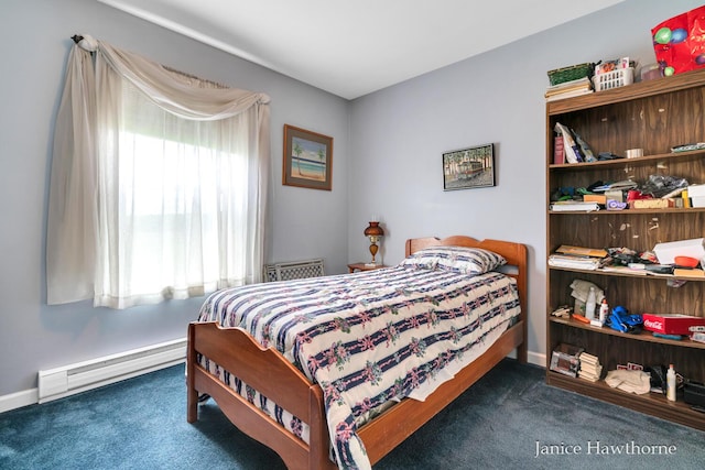 5777 N Broadway, Freeport, MI 49325 - carpeted bedroom with a baseboard heating unit and baseboards