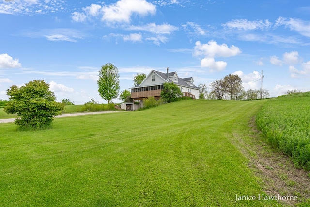 5777 N Broadway, Freeport, MI 49325 - view of grassy yard featuring a wooden deck