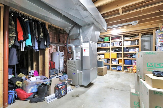 3457 S Keefer Hwy, Lyons, MI 48851 - unfinished below grade area featuring water heater and heating unit