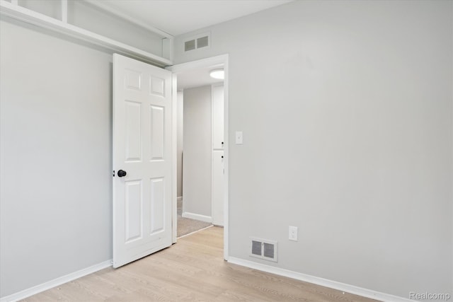 1932 Henbert Rd, West Bloomfield, MI 48324 - spare room with light wood finished floors and baseboards