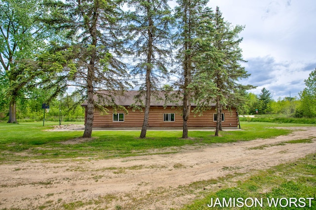 4403 4th St, Caledonia, MI 49316 - view of home's exterior with a yard