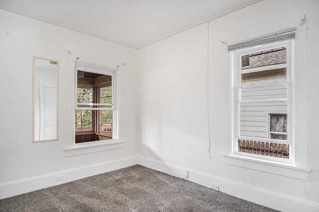 205 Corinne St SW, Grand Rapids, MI 49507 - carpeted spare room with baseboards