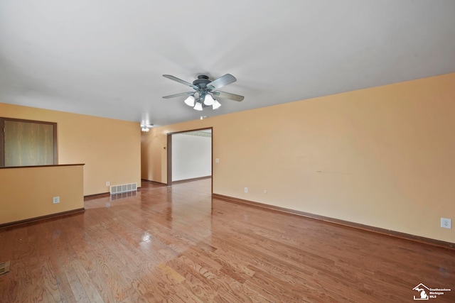 214 Roosevelt St, Dundee, MI 48131 - empty room featuring ceiling fan, wood finished floors, and baseboards