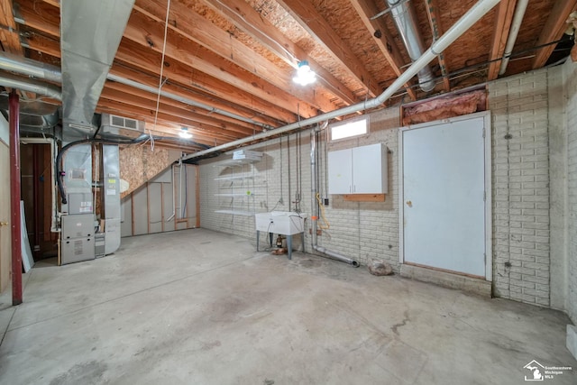 214 Roosevelt St, Dundee, MI 48131 - unfinished basement featuring heating unit