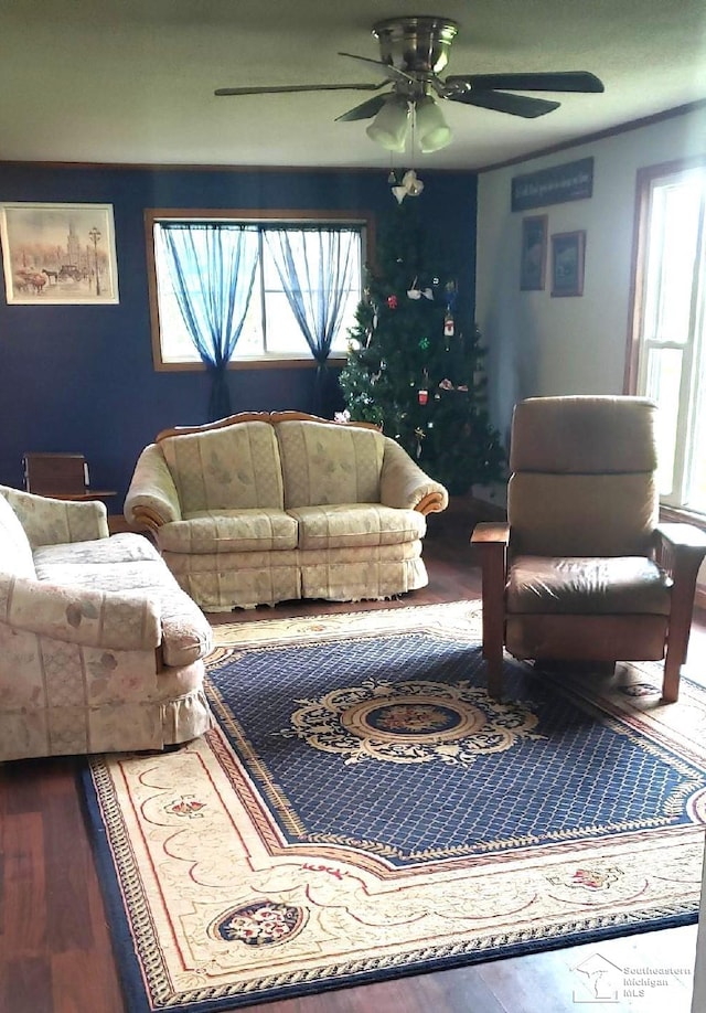9361 Exeter Rd, Carleton, MI 48117 - living area featuring a ceiling fan and wood finished floors