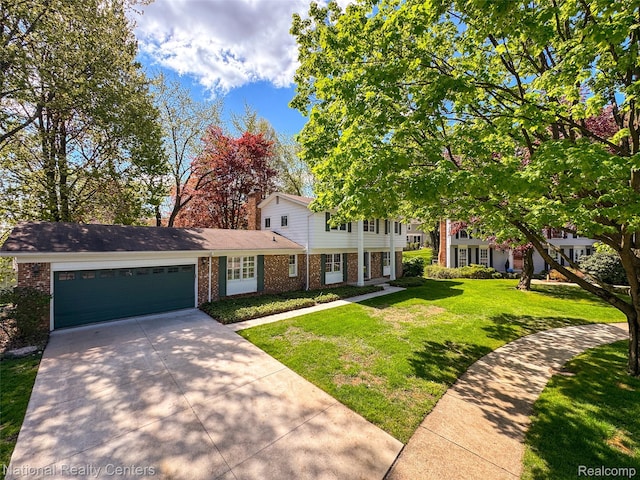 892 Hemlock Ct, Rochester, MI 48307 - view of front facade with brick siding, concrete driveway, a front yard, and a garage