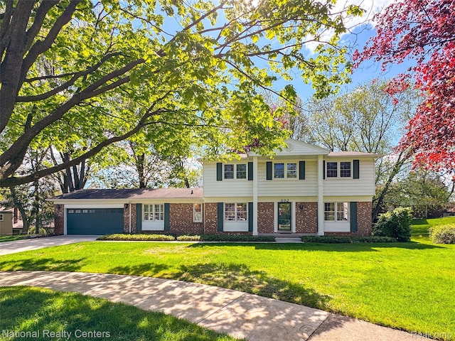892 Hemlock Ct, Rochester, MI 48307 - view of front of property featuring brick siding, an attached garage, driveway, and a front lawn