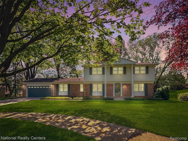 892 Hemlock Ct, Rochester, MI 48307 - colonial inspired home featuring brick siding, driveway, a garage, and a lawn