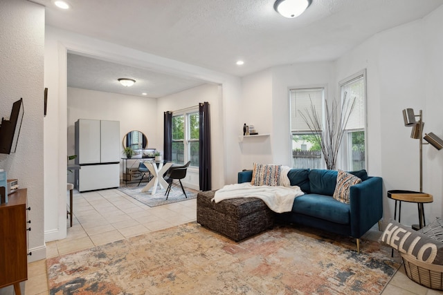 1645 College Ave SE, Grand Rapids, MI 49507 - living area featuring light tile patterned flooring and recessed lighting