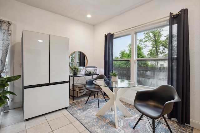 1645 College Ave SE, Grand Rapids, MI 49507 - dining area with light tile patterned floors and recessed lighting