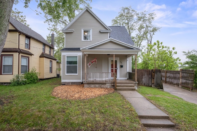 1645 College Ave SE, Grand Rapids, MI 49507 - view of front facade with covered porch and a shingled roof