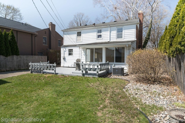 1205 S Bates St, Birmingham, MI 48009 - rear view of property featuring a chimney, central AC, and a wooden deck