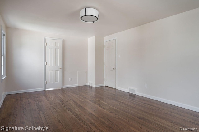 1205 S Bates St, Birmingham, MI 48009 - spare room with dark wood-style floors and baseboards