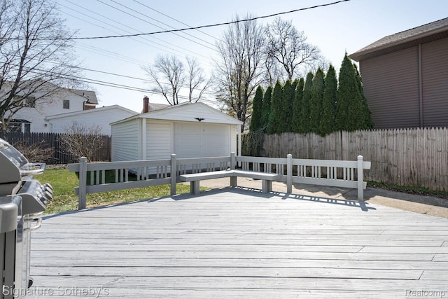 1205 S Bates St, Birmingham, MI 48009 - deck featuring a garage, an outdoor structure, and a fenced backyard