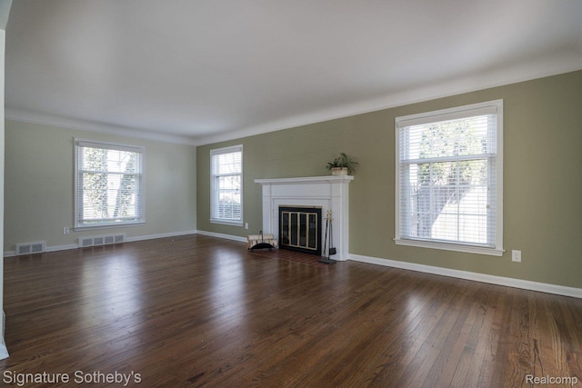 1205 S Bates St, Birmingham, MI 48009 - unfurnished living room featuring ornamental molding, a brick fireplace, dark wood finished floors, and baseboards