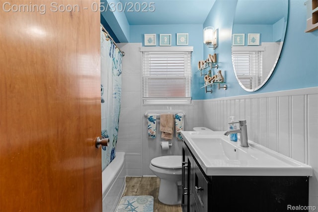 25305 Ursuline St, Saint Clair Shores, MI 48081 - bathroom with toilet, vanity, wood finished floors, wainscoting, and shower / bath combo