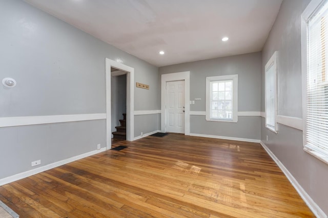 617 Wheaton Ave, Kalamazoo, MI 49008 - foyer featuring stairs, wood finished floors, recessed lighting, and baseboards