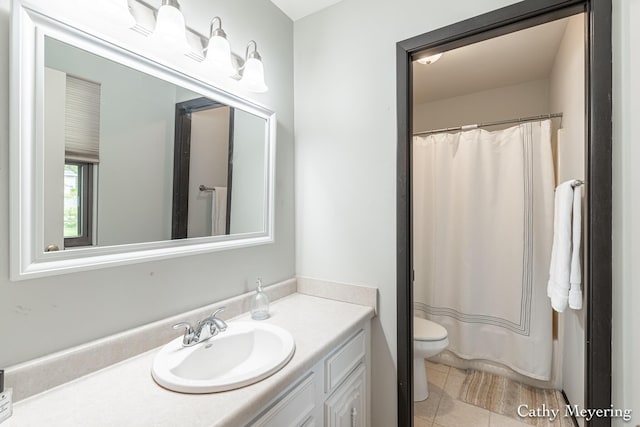 6387 Wainscot Dr SE Unit 102, Grand Rapids, MI 49546 - bathroom with toilet, vanity, tile patterned floors, and curtained shower
