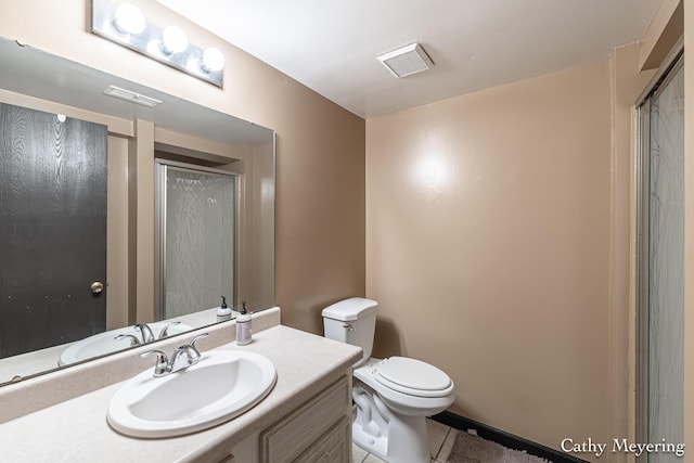 6387 Wainscot Dr SE Unit 102, Grand Rapids, MI 49546 - bathroom with toilet, vanity, and tile patterned floors