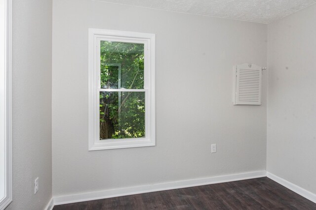 1226 Shakespeare Ave, Kalamazoo, MI 49001 - empty room with dark wood-style flooring and baseboards