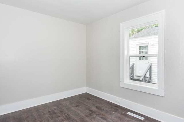 1226 Shakespeare Ave, Kalamazoo, MI 49001 - spare room featuring dark wood finished floors and baseboards