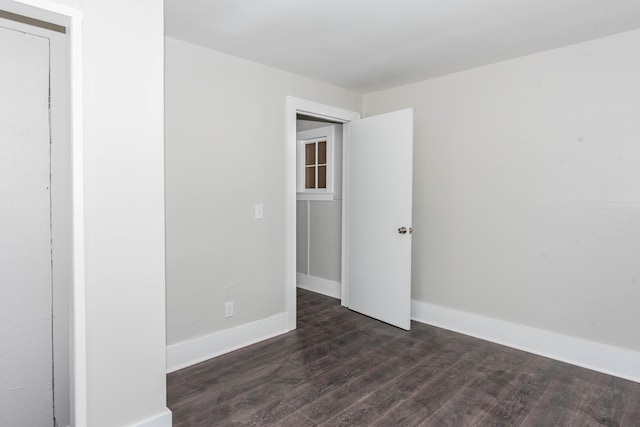 1226 Shakespeare Ave, Kalamazoo, MI 49001 - unfurnished room with dark wood finished floors and baseboards
