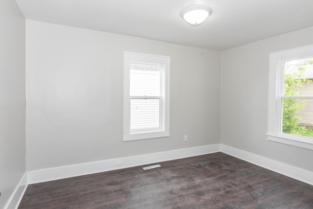 1226 Shakespeare Ave, Kalamazoo, MI 49001 - empty room featuring dark wood-type flooring and baseboards