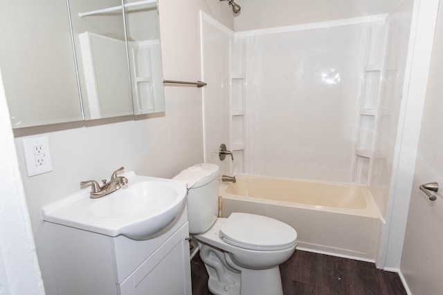 1226 Shakespeare Ave, Kalamazoo, MI 49001 - full bath featuring vanity, toilet, tub / shower combination, and wood finished floors