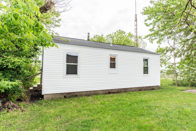 1226 Shakespeare Ave, Kalamazoo, MI 49001 - view of side of home featuring roof with shingles