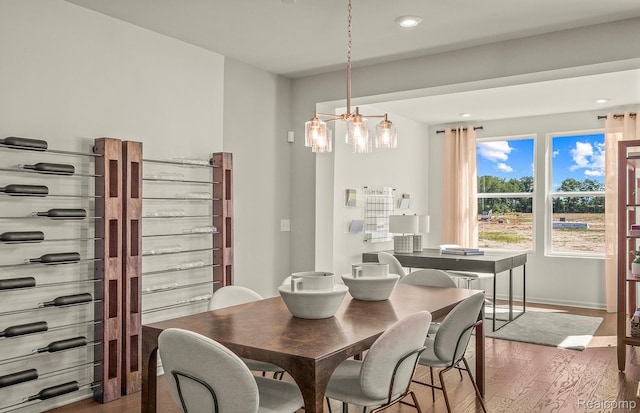 103 Addison Cir, Walled Lake, MI 48390 - dining area featuring wood finished floors, a chandelier, recessed lighting, and baseboards