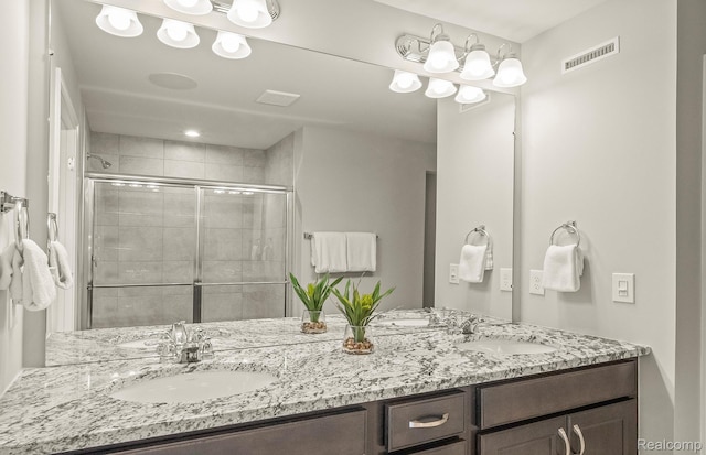 103 Addison Cir, Walled Lake, MI 48390 - bathroom with double vanity and a stall shower