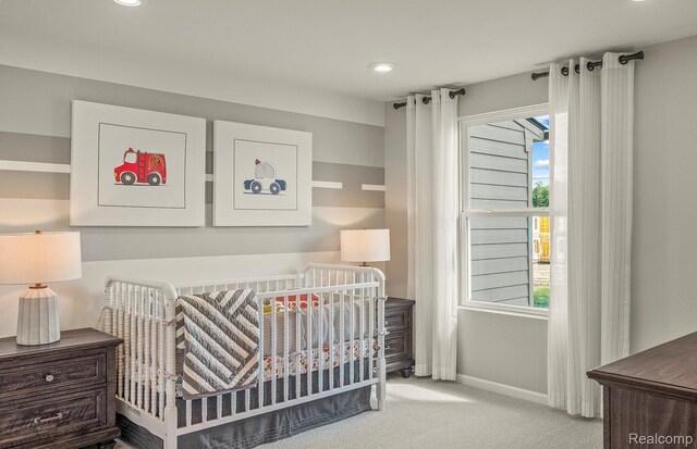 103 Addison Cir, Walled Lake, MI 48390 - carpeted bedroom featuring multiple windows, baseboards, a nursery area, and recessed lighting