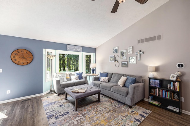 4465 Spinnaker Ln, Pleasant Lake, MI 49272 - living room featuring wood finished floors, vaulted ceiling, baseboards, a ceiling fan, and a textured ceiling