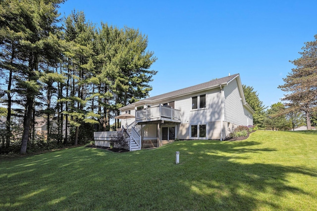 4465 Spinnaker Ln, Pleasant Lake, MI 49272 - rear view of property with stairway, a deck, and a lawn