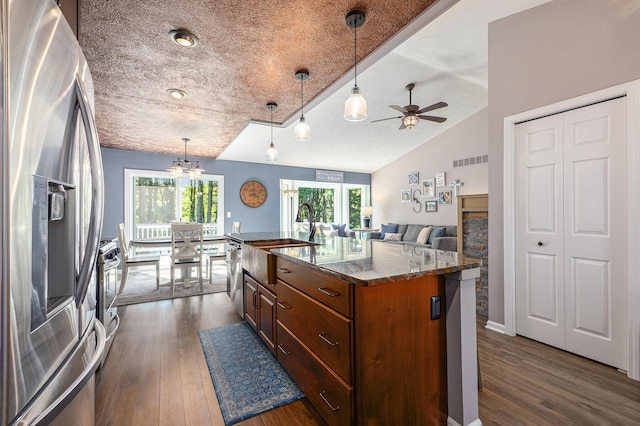 4465 Spinnaker Ln, Pleasant Lake, MI 49272 - kitchen featuring appliances with stainless steel finishes, a sink, dark wood-type flooring, a ceiling fan, and lofted ceiling