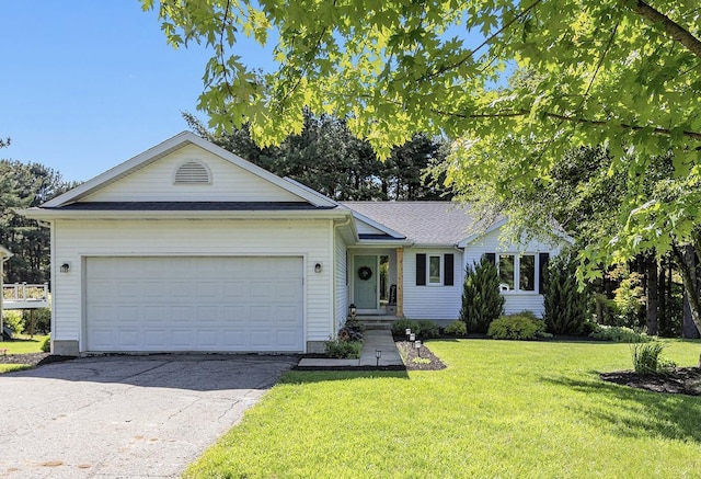 4465 Spinnaker Ln, Pleasant Lake, MI 49272 - ranch-style home featuring asphalt driveway, a front yard, a garage, and a shingled roof