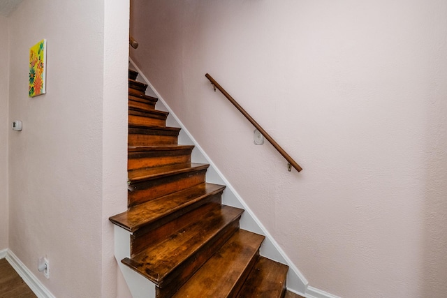 2630 Willa Dr, Saint Joseph, MI 49085 - stairs featuring baseboards and wood finished floors