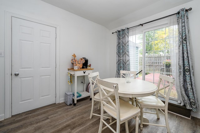 2630 Willa Dr, Saint Joseph, MI 49085 - dining room featuring wood finished floors and lofted ceiling