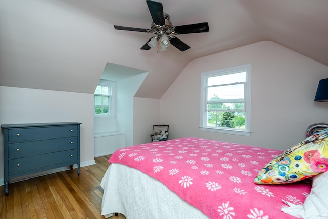 2630 Willa Dr, Saint Joseph, MI 49085 - bedroom with wood-type flooring, lofted ceiling, and a ceiling fan