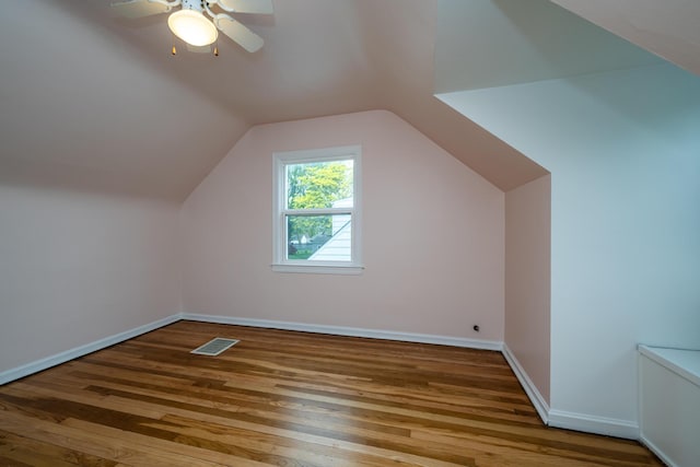 2630 Willa Dr, Saint Joseph, MI 49085 - bonus room with wood finished floors, baseboards, vaulted ceiling, and ceiling fan