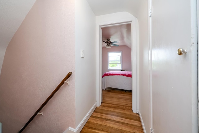 2630 Willa Dr, Saint Joseph, MI 49085 - corridor featuring vaulted ceiling, light wood-style flooring, and baseboards