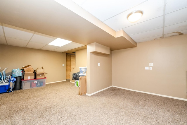 2630 Willa Dr, Saint Joseph, MI 49085 - finished basement with carpet, a paneled ceiling, and baseboards