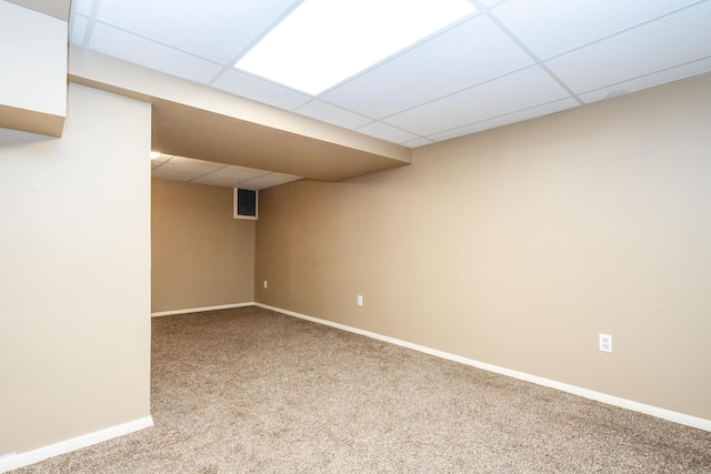 2630 Willa Dr, Saint Joseph, MI 49085 - finished below grade area with a drop ceiling, carpet flooring, and baseboards