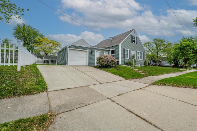 2630 Willa Dr, Saint Joseph, MI 49085 - view of front of house with driveway and a garage