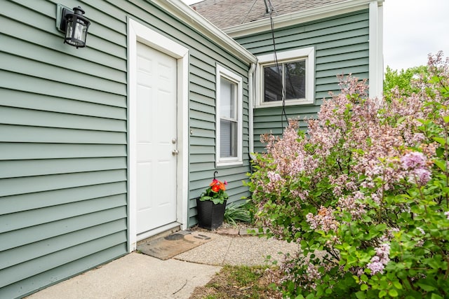 2630 Willa Dr, Saint Joseph, MI 49085 - entrance to property featuring a shingled roof