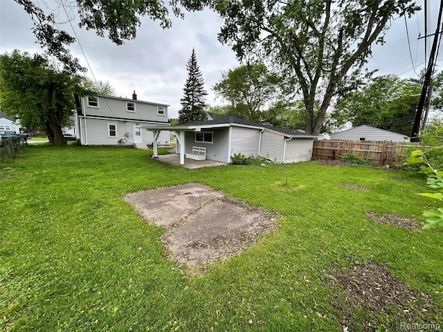 33050 John Hauk St, Garden City, MI 48135 - rear view of house with a patio area