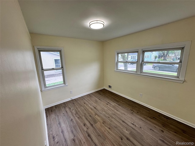 33050 John Hauk St, Garden City, MI 48135 - unfurnished room featuring dark wood-type flooring and baseboards