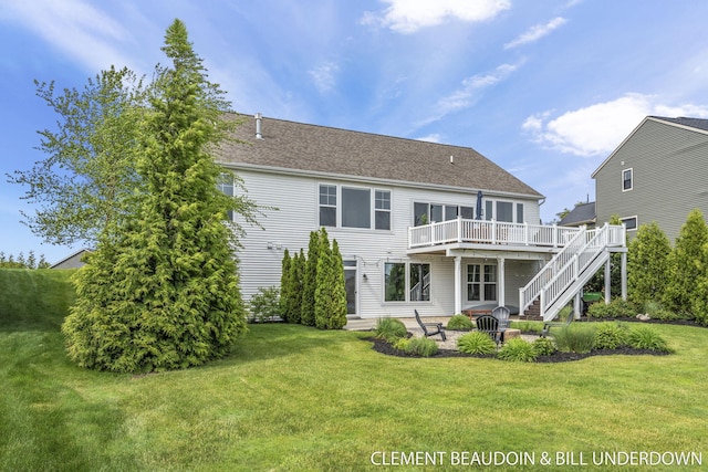13944 Harrington Lndg, Holland, MI 49424 - rear view of house featuring a deck, a patio, stairs, and a lawn
